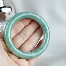 Load image into Gallery viewer, 101855 55.4mm Translucent Watery Green Rounded Jadeite Bangle
