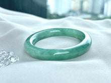 Load image into Gallery viewer, 101855 55.4mm Translucent Watery Green Rounded Jadeite Bangle
