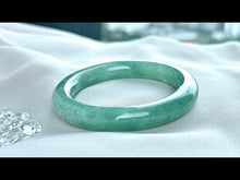 Load and play video in Gallery viewer, 101855 55.4mm Translucent Watery Green Rounded Jadeite Bangle
